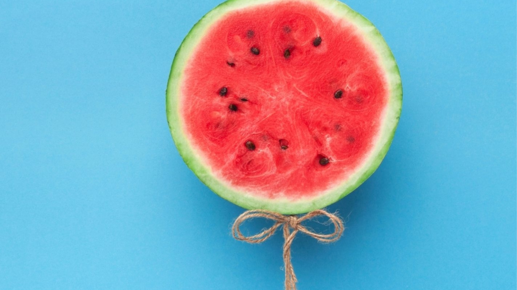 watermelon-balloon-on-blue-background-creative-57PNH8Q-1423x1197