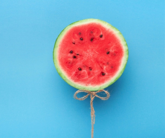 watermelon-balloon-on-blue-background-creative-57PNH8Q-1423x1197