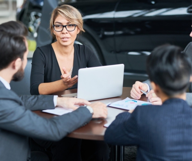 working-meeting-of-car-dealers-SYZR3GH-1423x1197